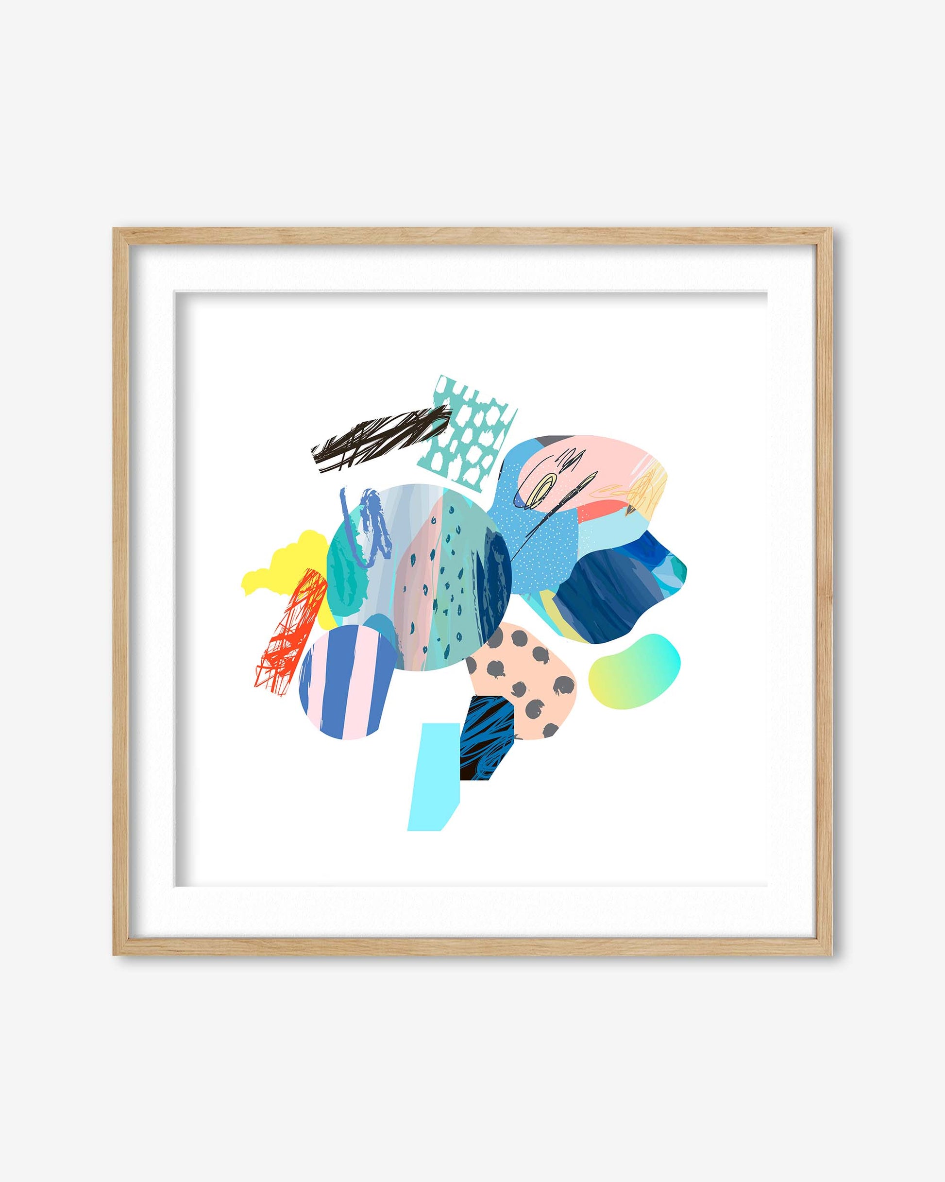Colorful abstract art print in a wooden frame on a white wall