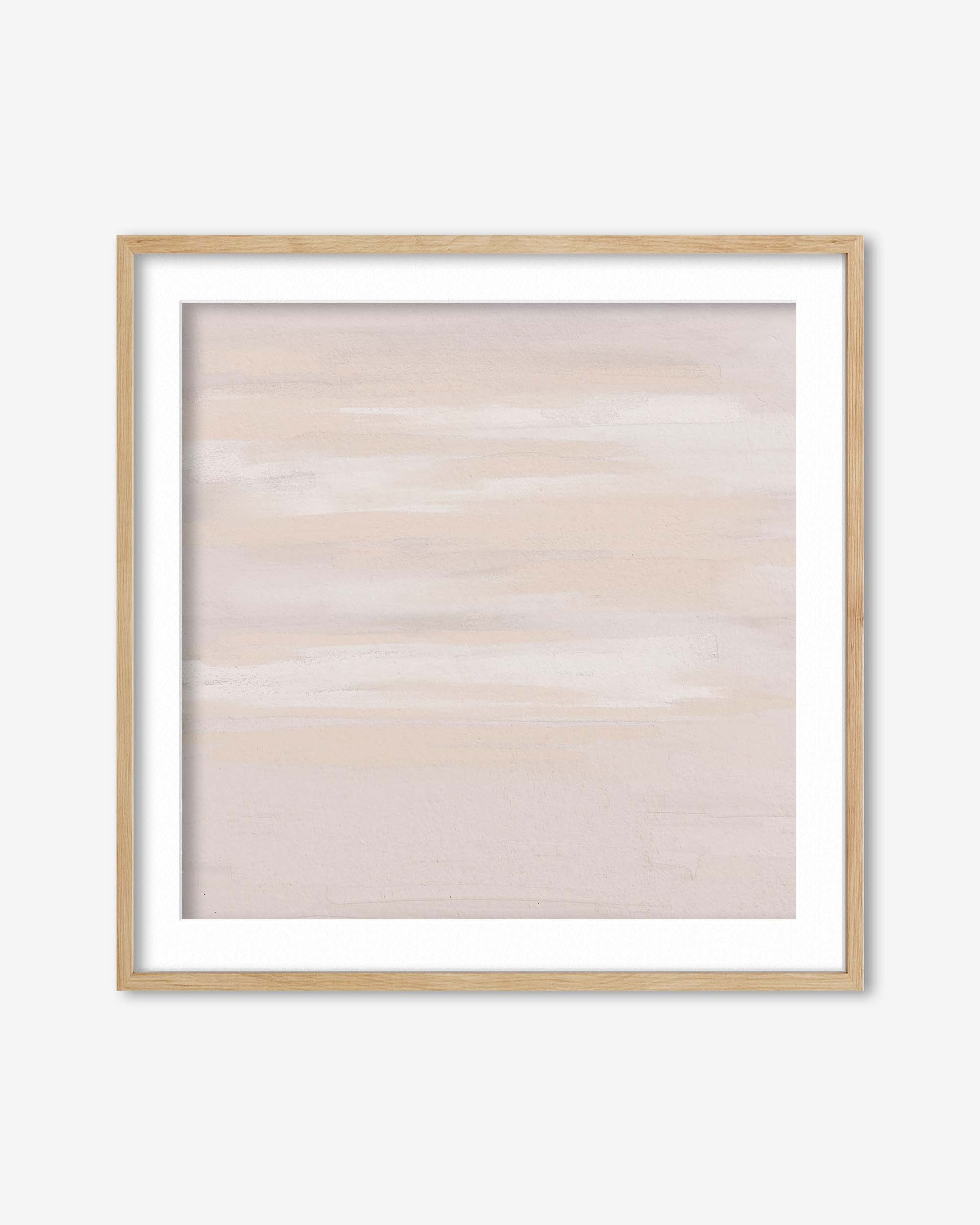 Framed abstract art with soft color palette on a light gray background