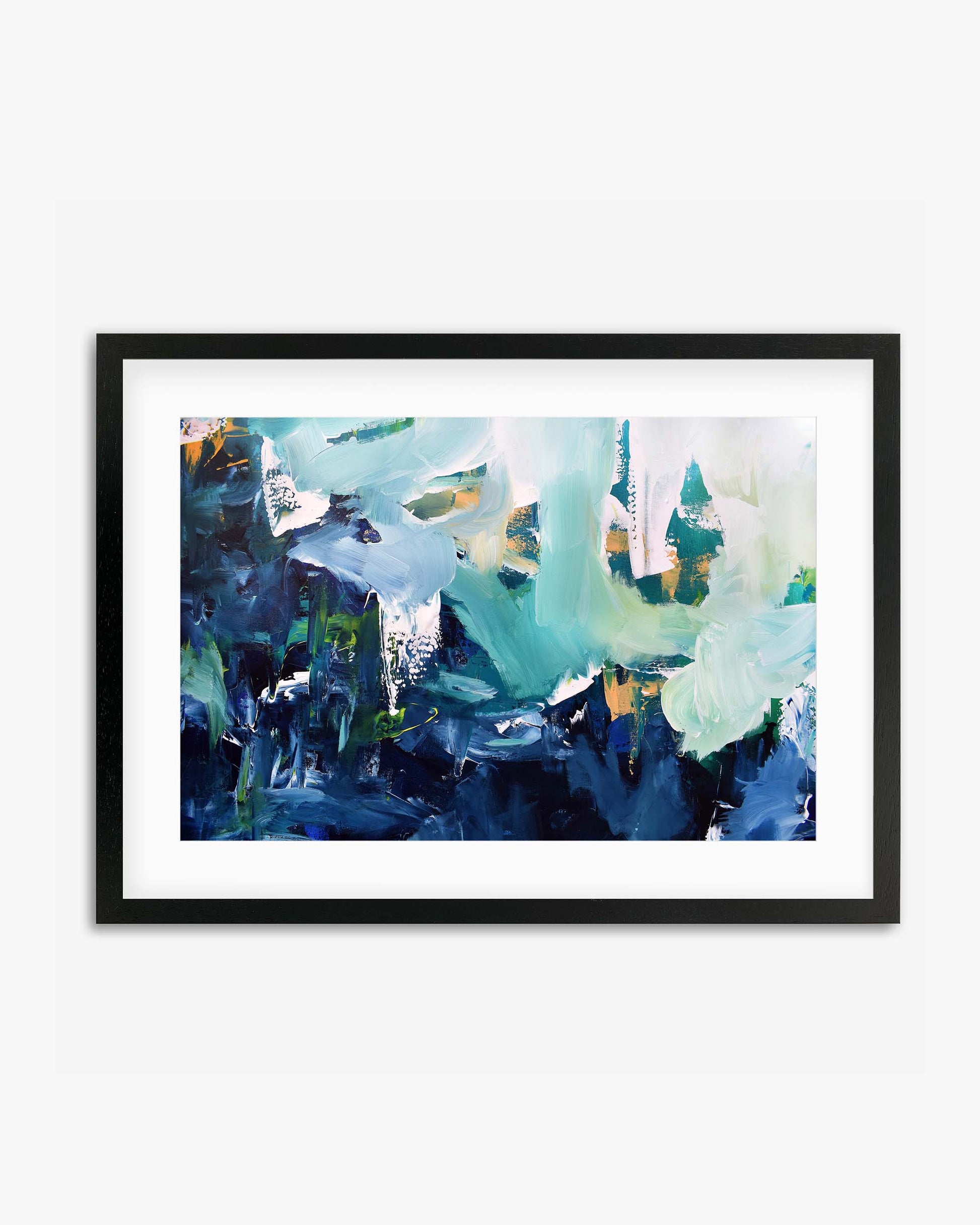 A framed art piece with abstract design, featuring deep blue and bright white tones with hints of orange, encased in a black frame.