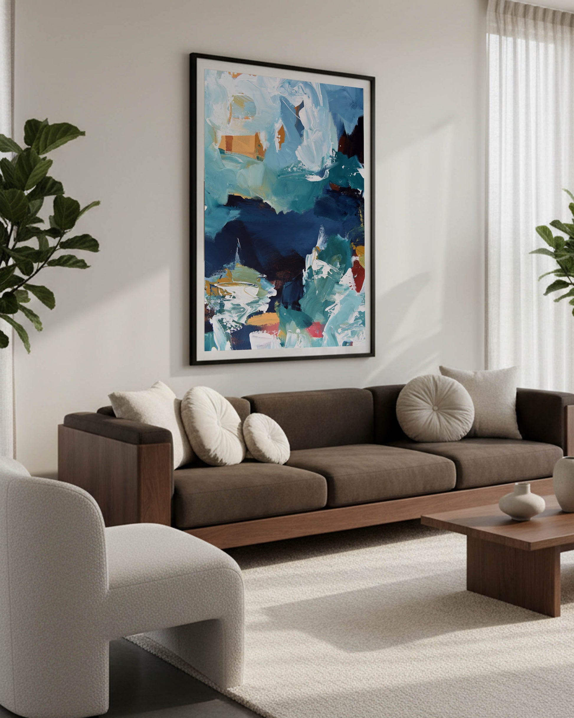 Modern living room with a brown sofa, abstract art on the wall, and a plant.