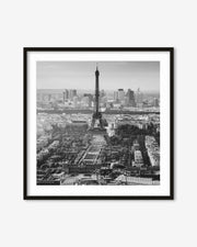 Framed black and white print of the Eiffel Tower and Paris skyline.