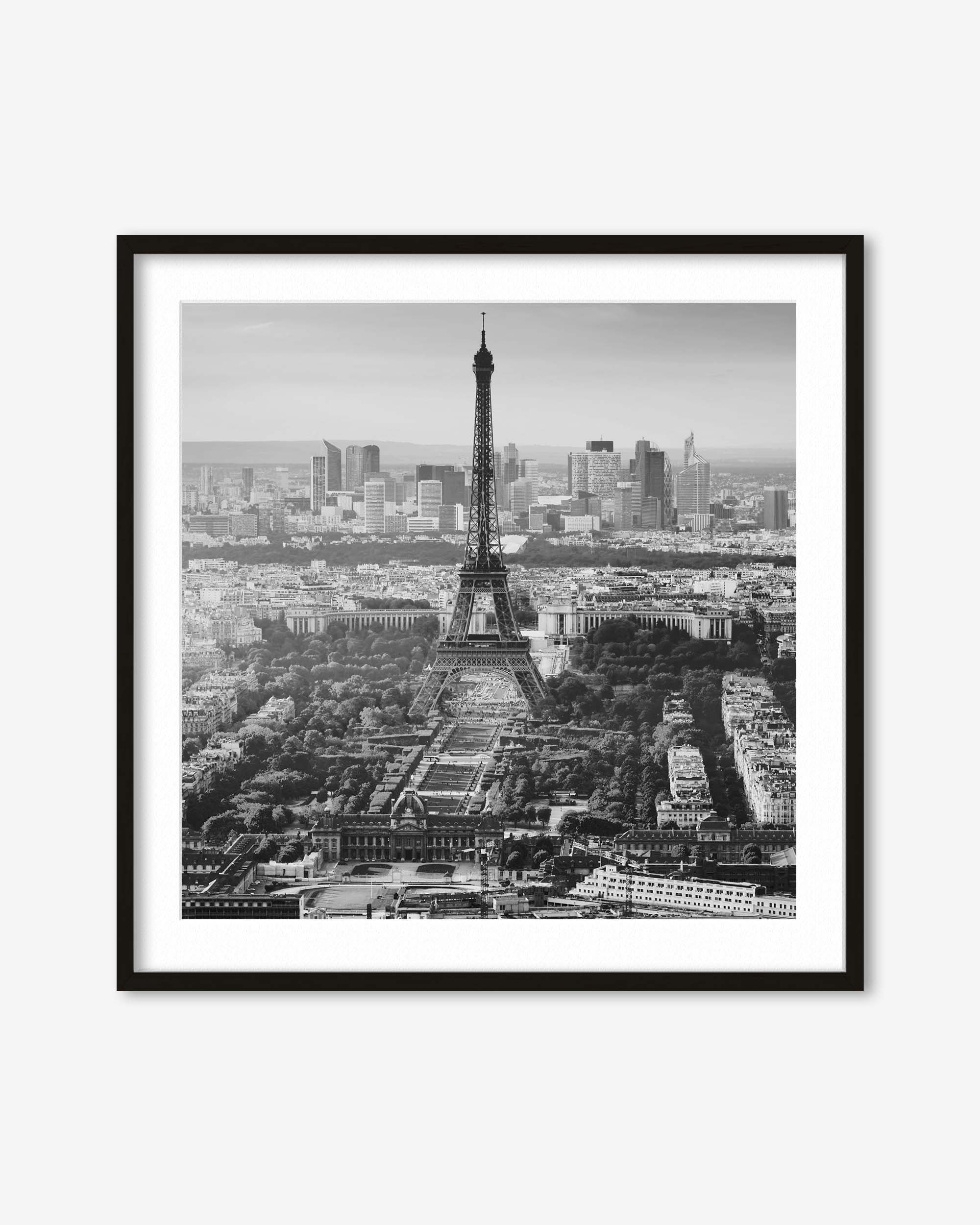 Framed black and white print of the Eiffel Tower and Paris skyline.