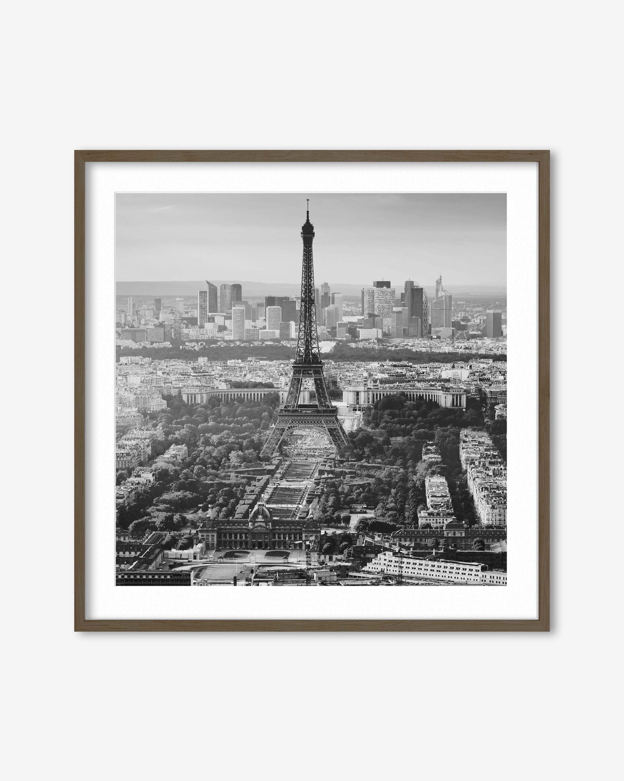 Framed black and white print of the Eiffel Tower and Paris skyline.