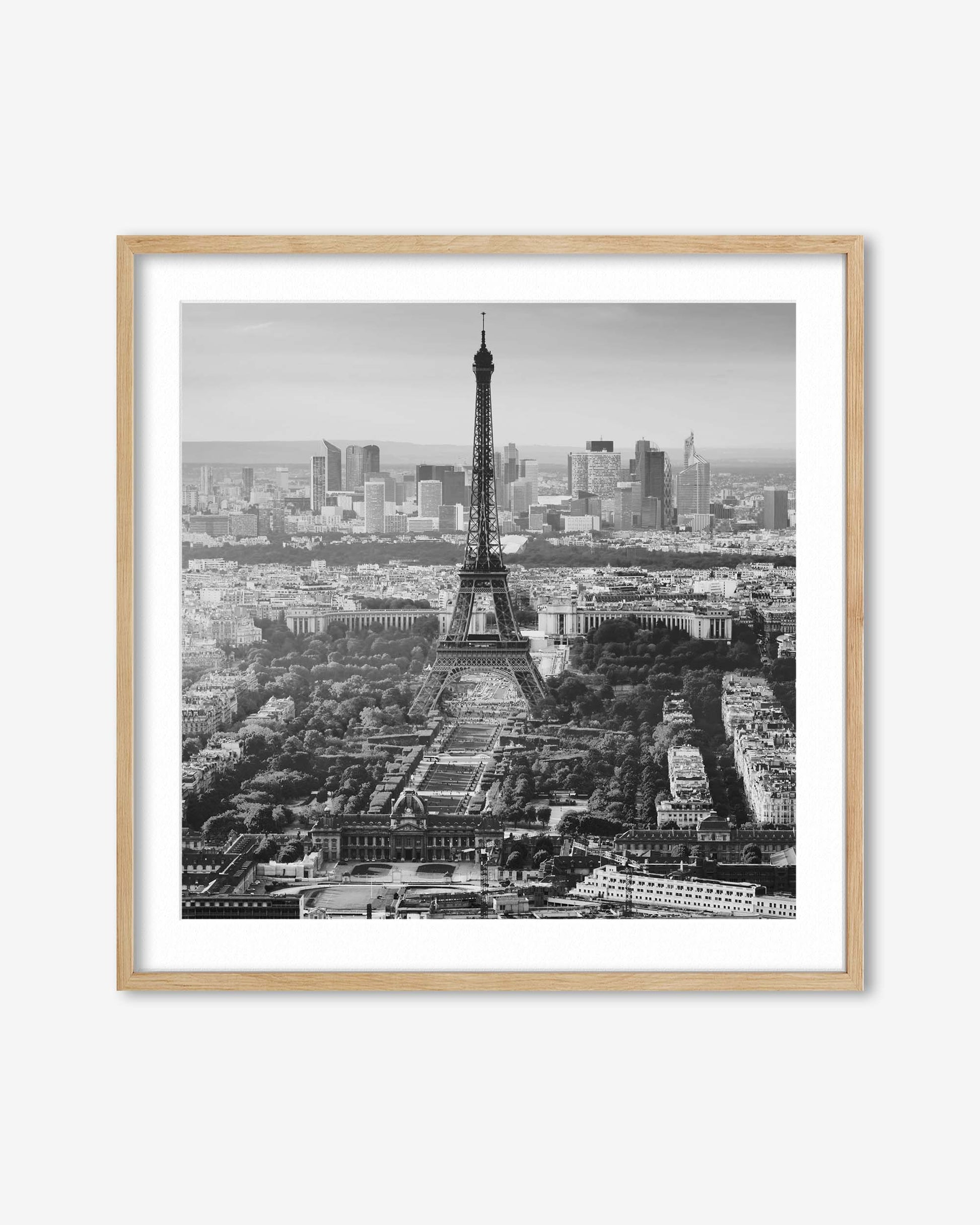 Framed black and white print of the Eiffel Tower and Paris skyline.