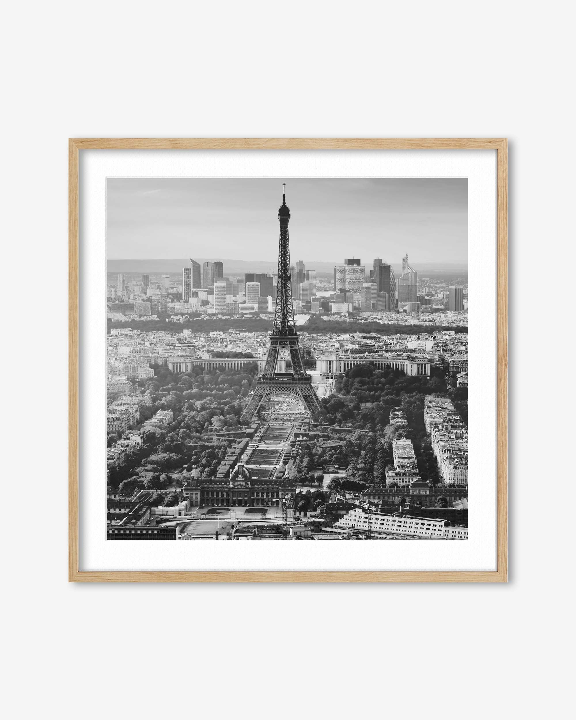 Framed black and white print of the Eiffel Tower and Paris skyline.