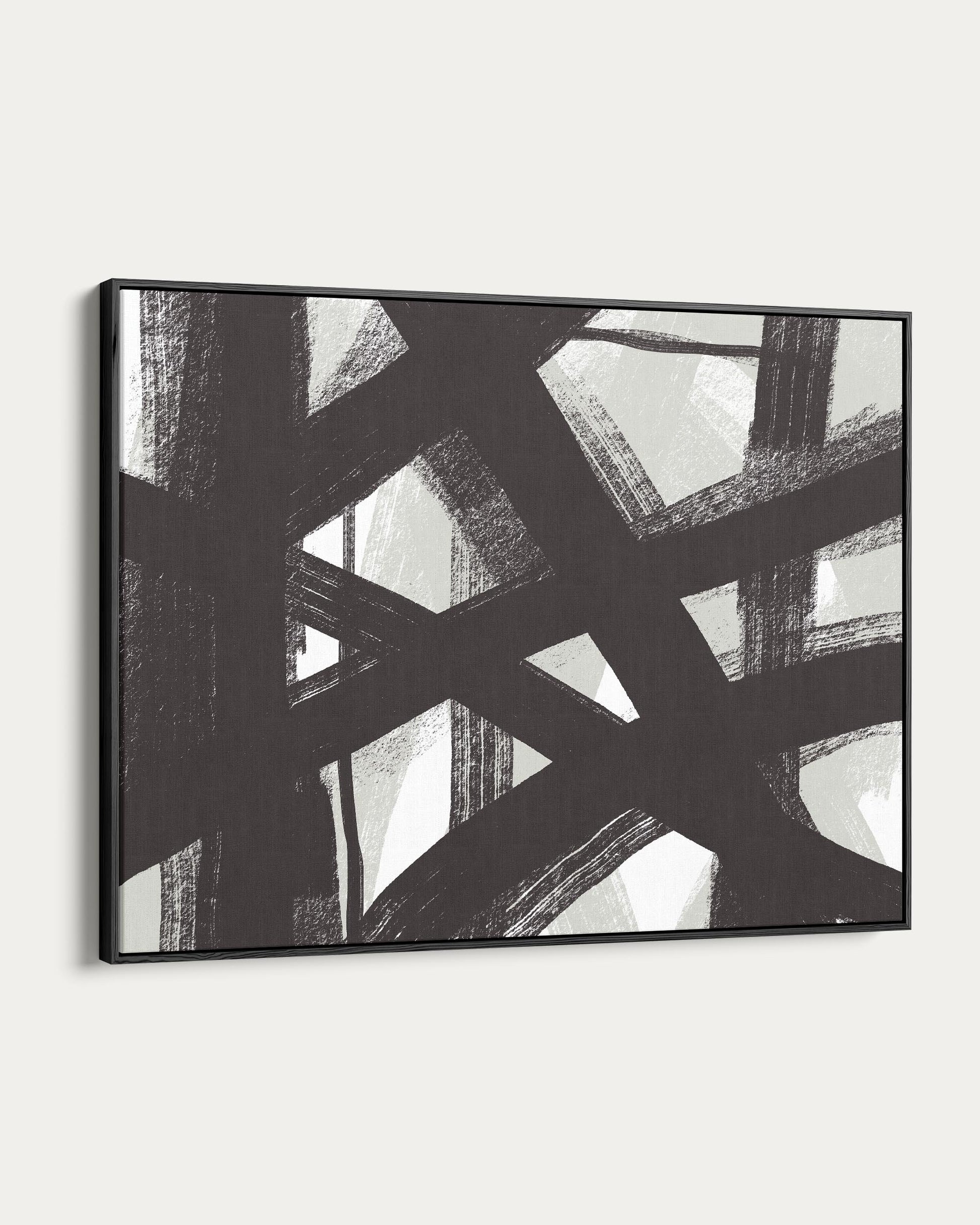 Abstract black and white artwork in a black frame on a white background