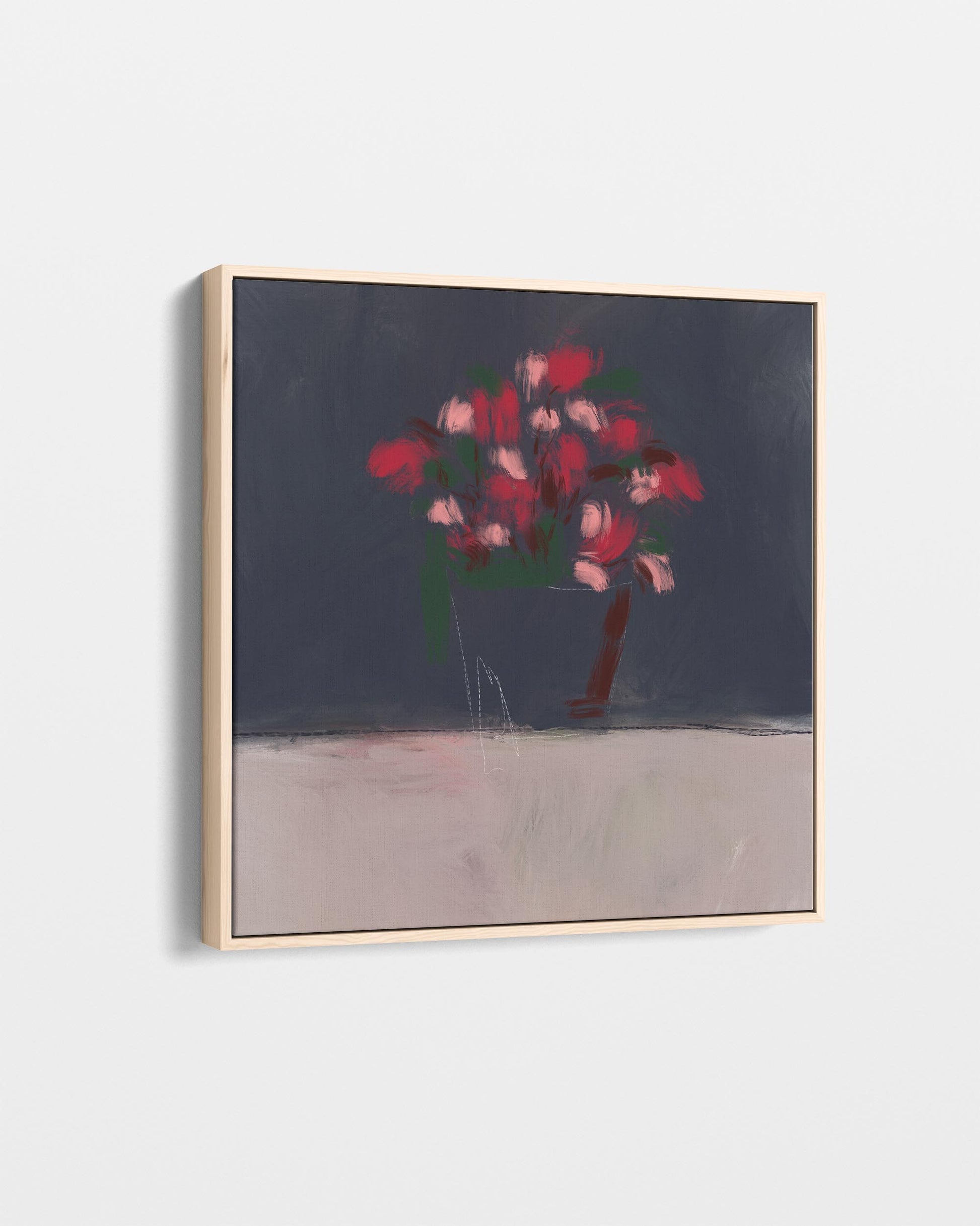 Abstract painting with pink flowers on a dark background, framed in gold.