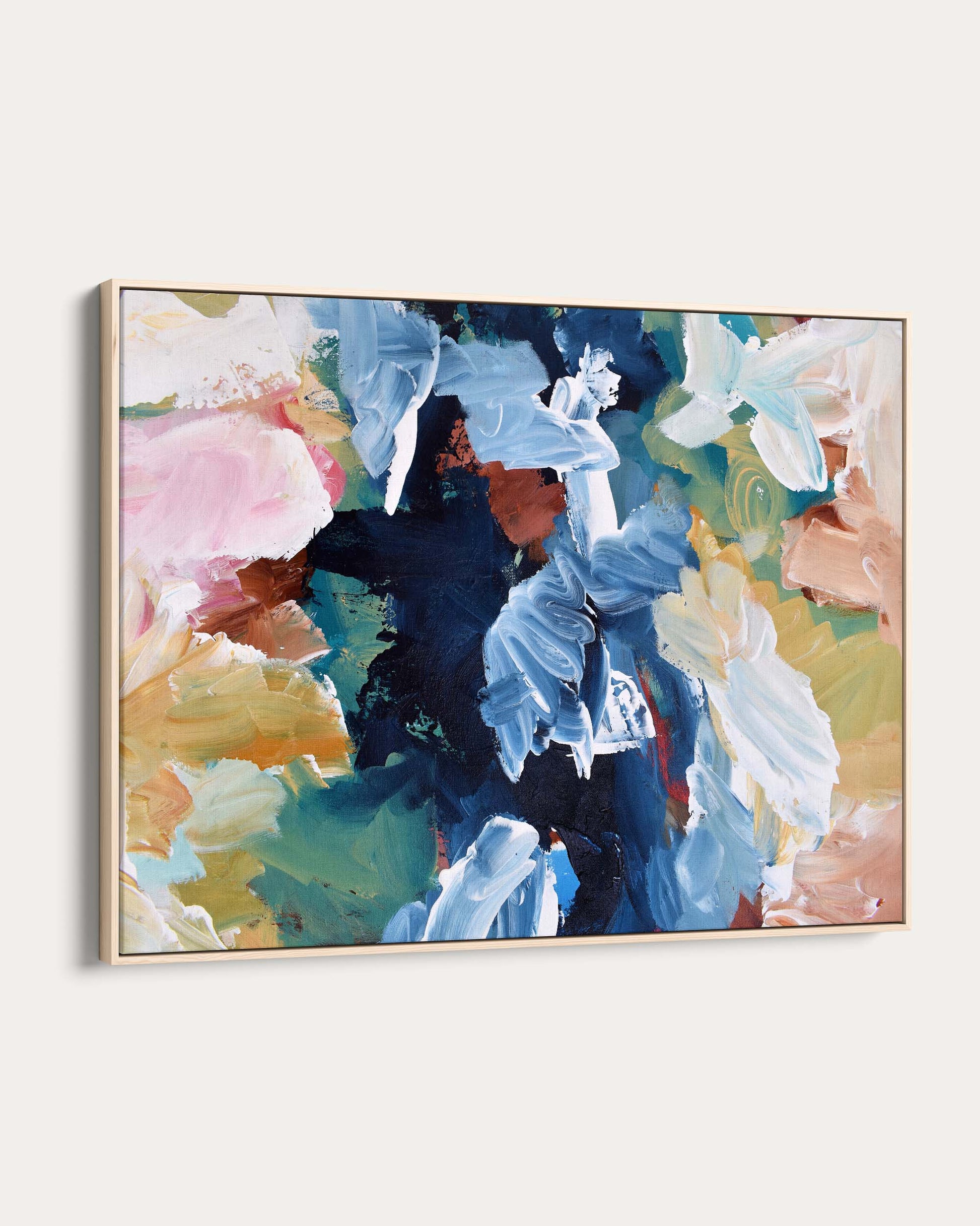 Abstract painting with colorful floral design on a white wall