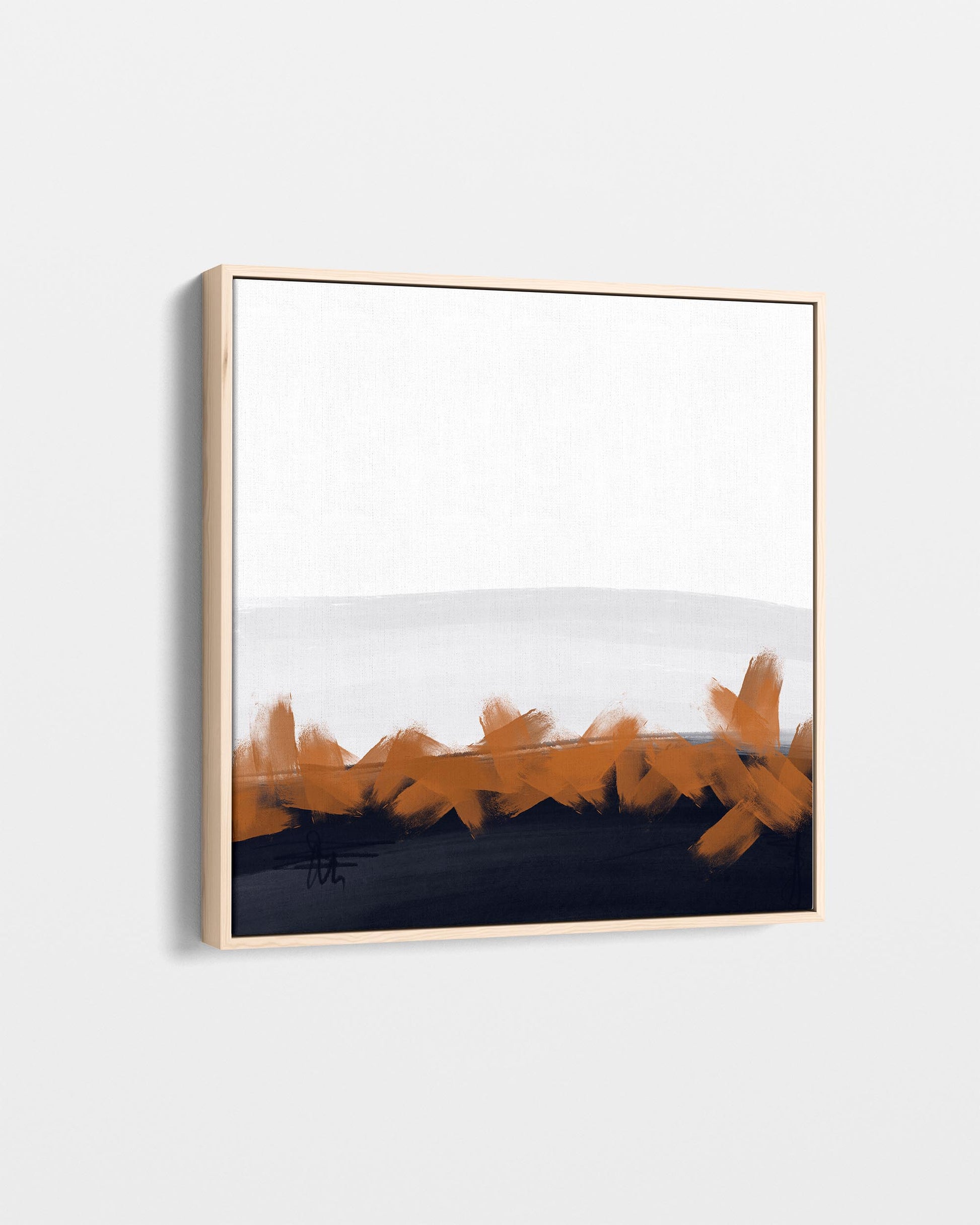 Framed abstract art with orange brush strokes on a white background