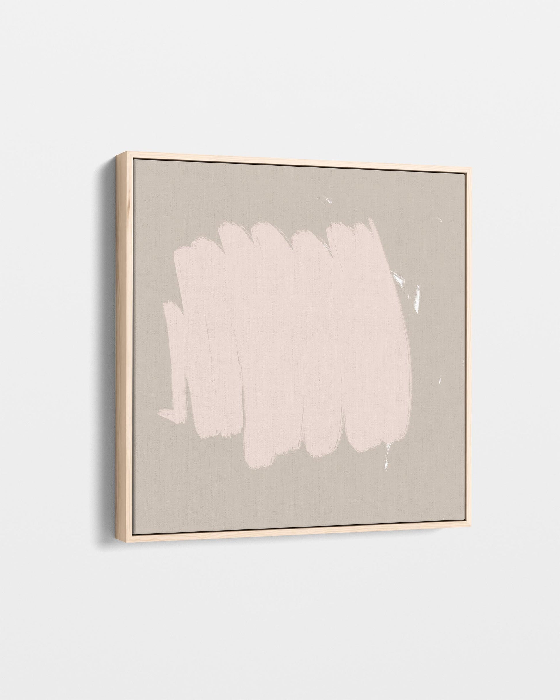 Framed abstract art piece with a white brushstroke on a light gray background
