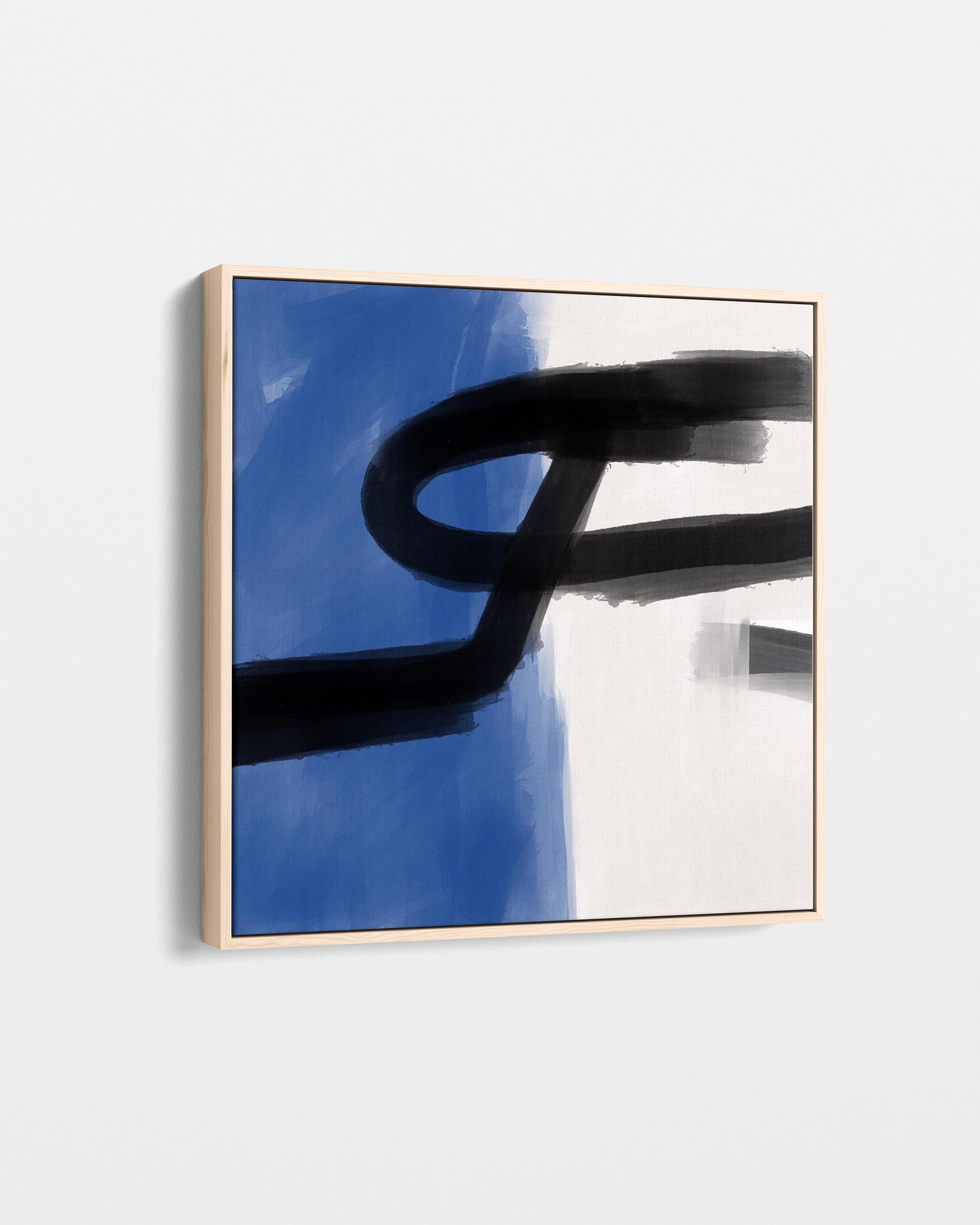 Abstract art piece with black brushstroke design on a blue background, framed in gold.