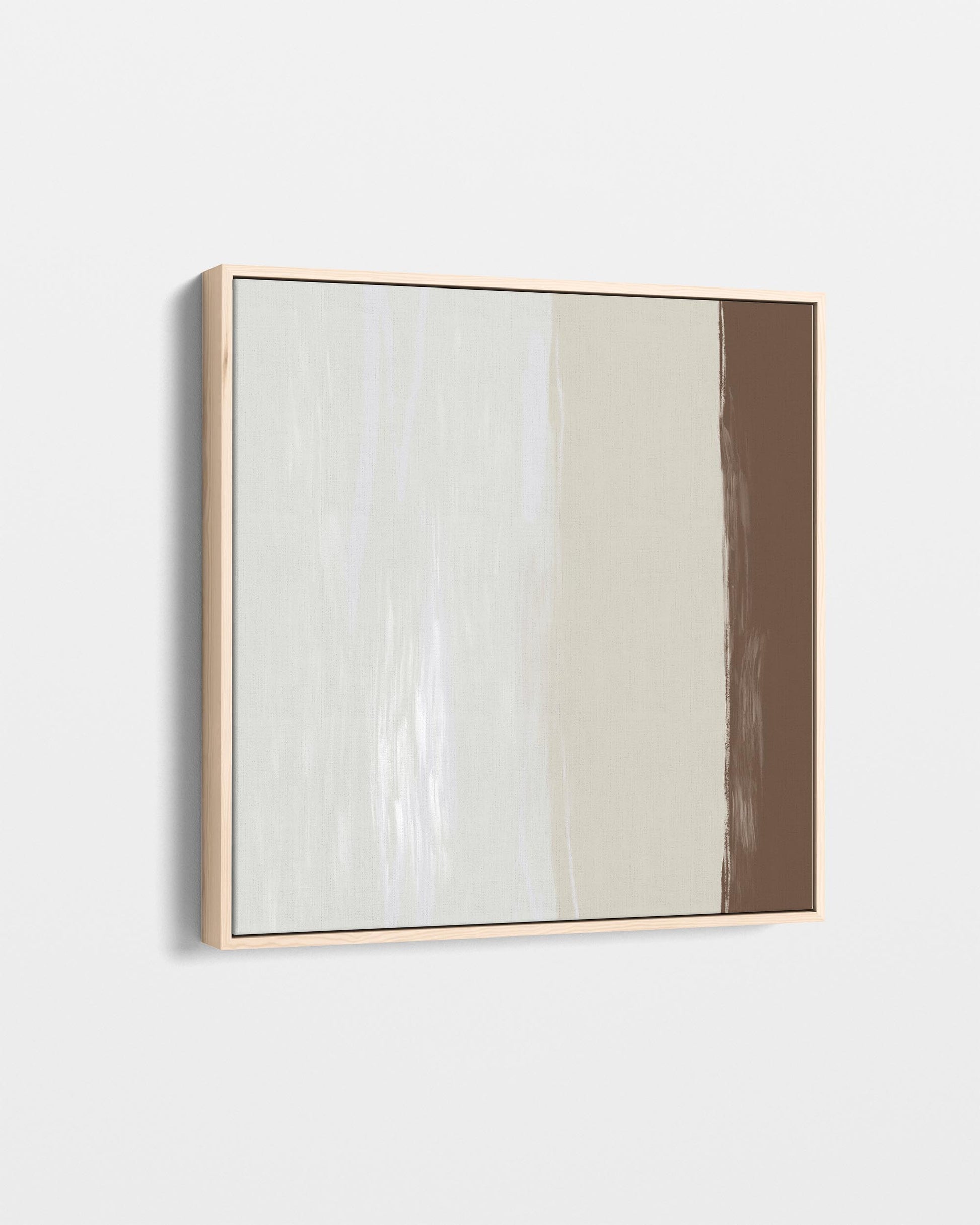 Rectangular mirror with a wooden frame on a white wall