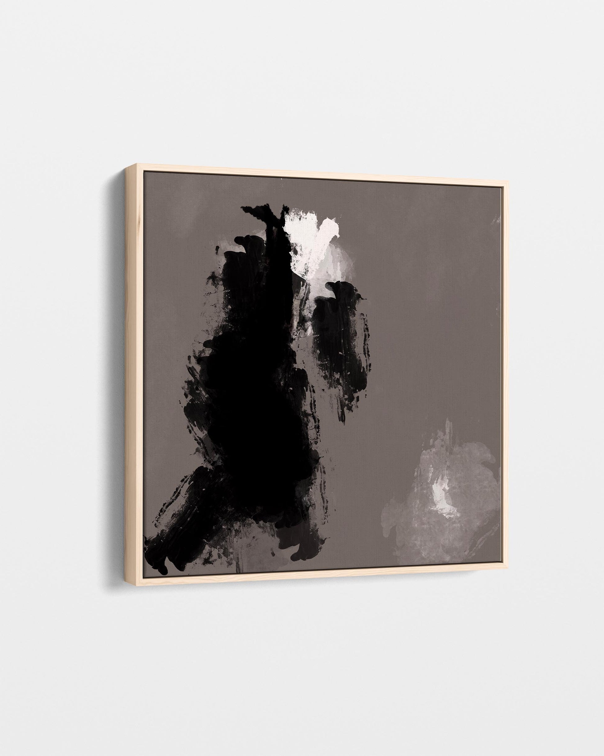 Abstract art piece with black and white shapes on a gray background