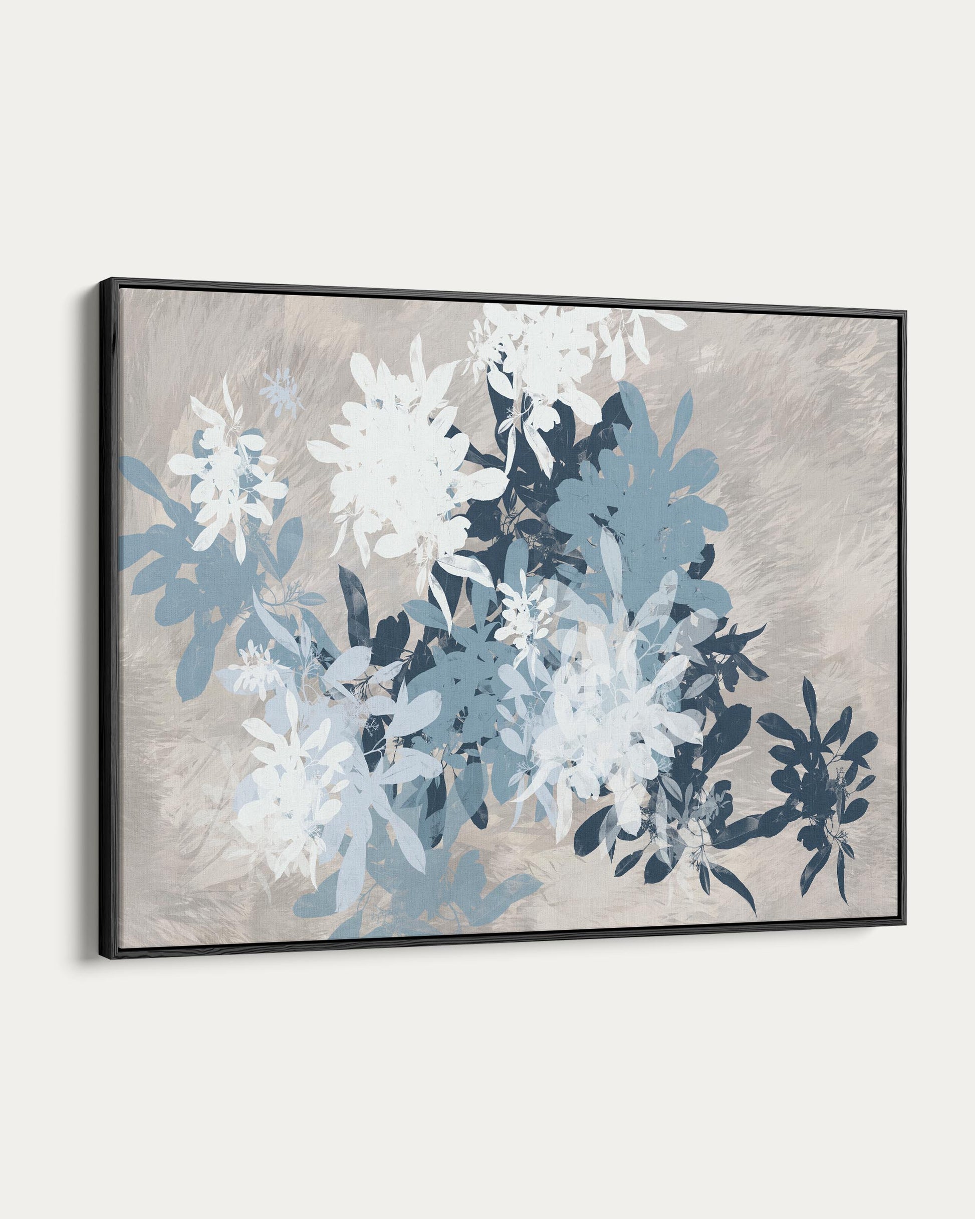 Framed abstract art with blue and white floral design on a beige background