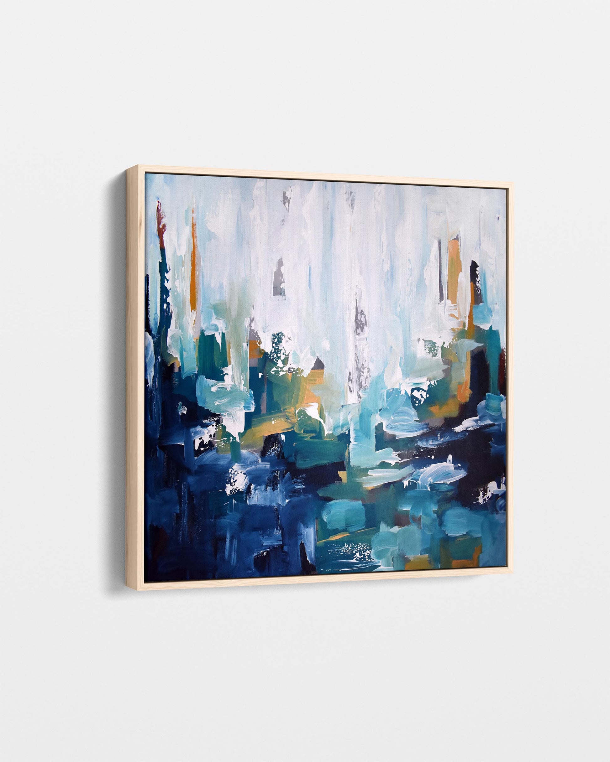 Abstract painting with blue, green, and gold colors on a white background