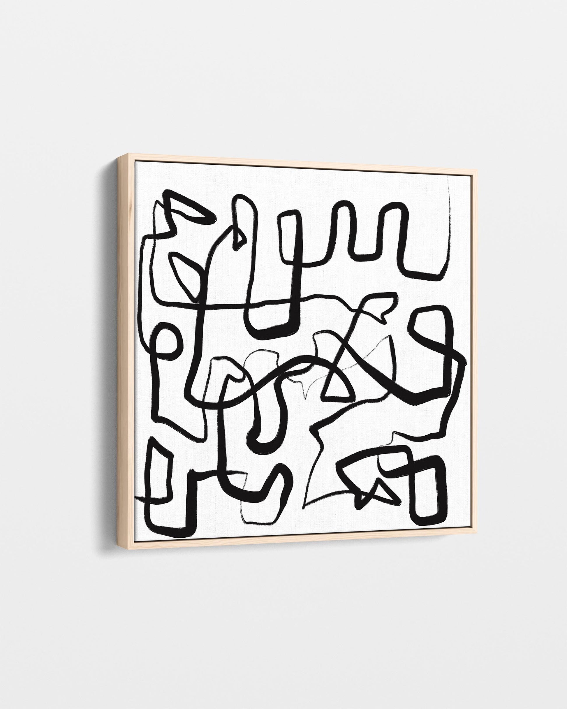 Abstract black line art on a white background with a gold frame