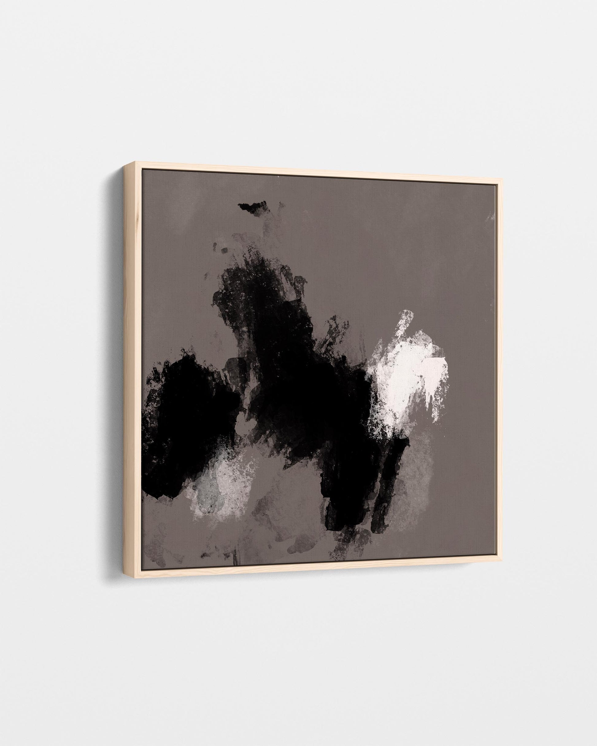 Abstract art piece with black and white brush strokes on a gray background