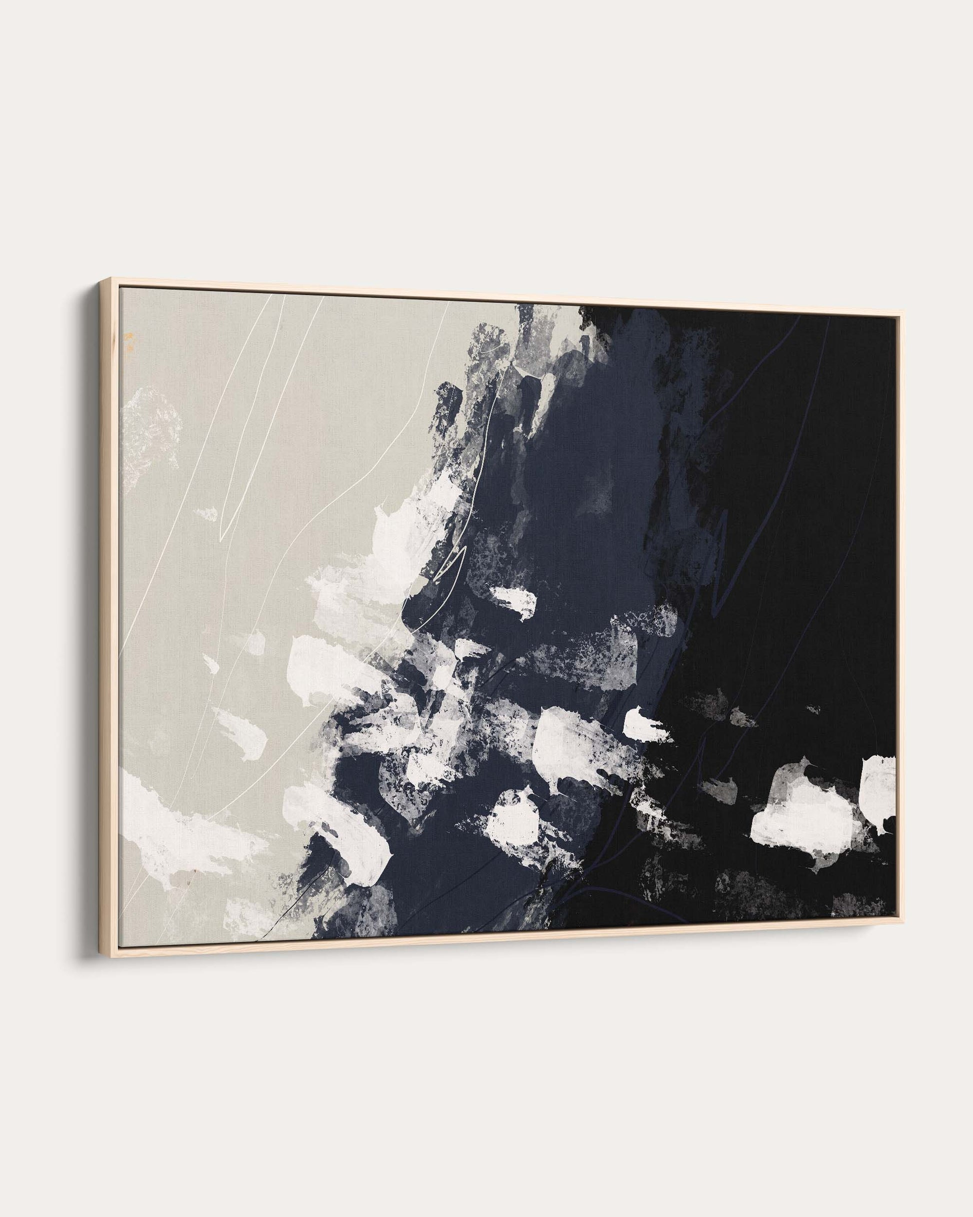 Abstract art piece with black, white, and gray colors on a light background
