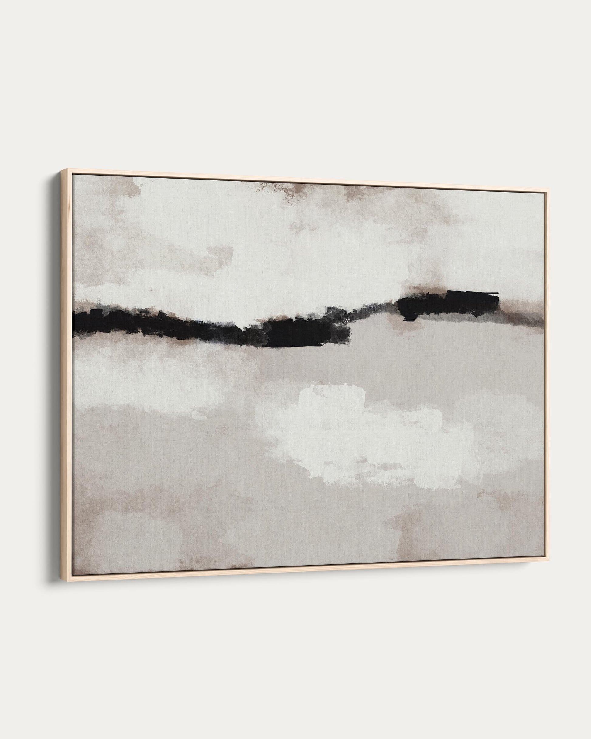 Abstract art piece with black and white brush strokes in a gold frame on a white background