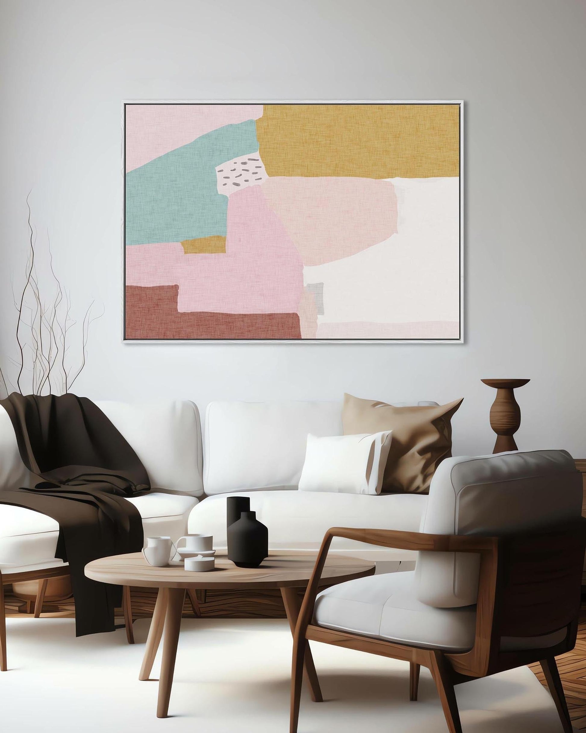 Modern living room with a white sofa, wooden coffee table, and abstract art on the wall.