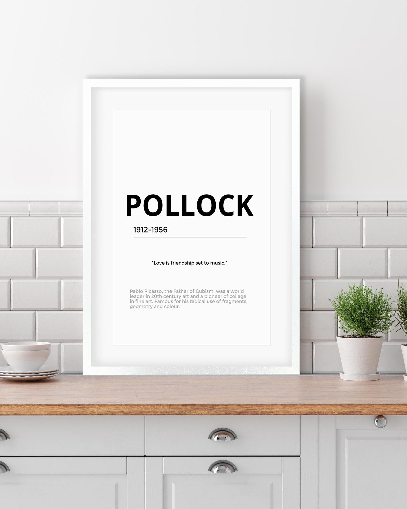 Framed poster with 'POLLOCK' and text on a kitchen counter.