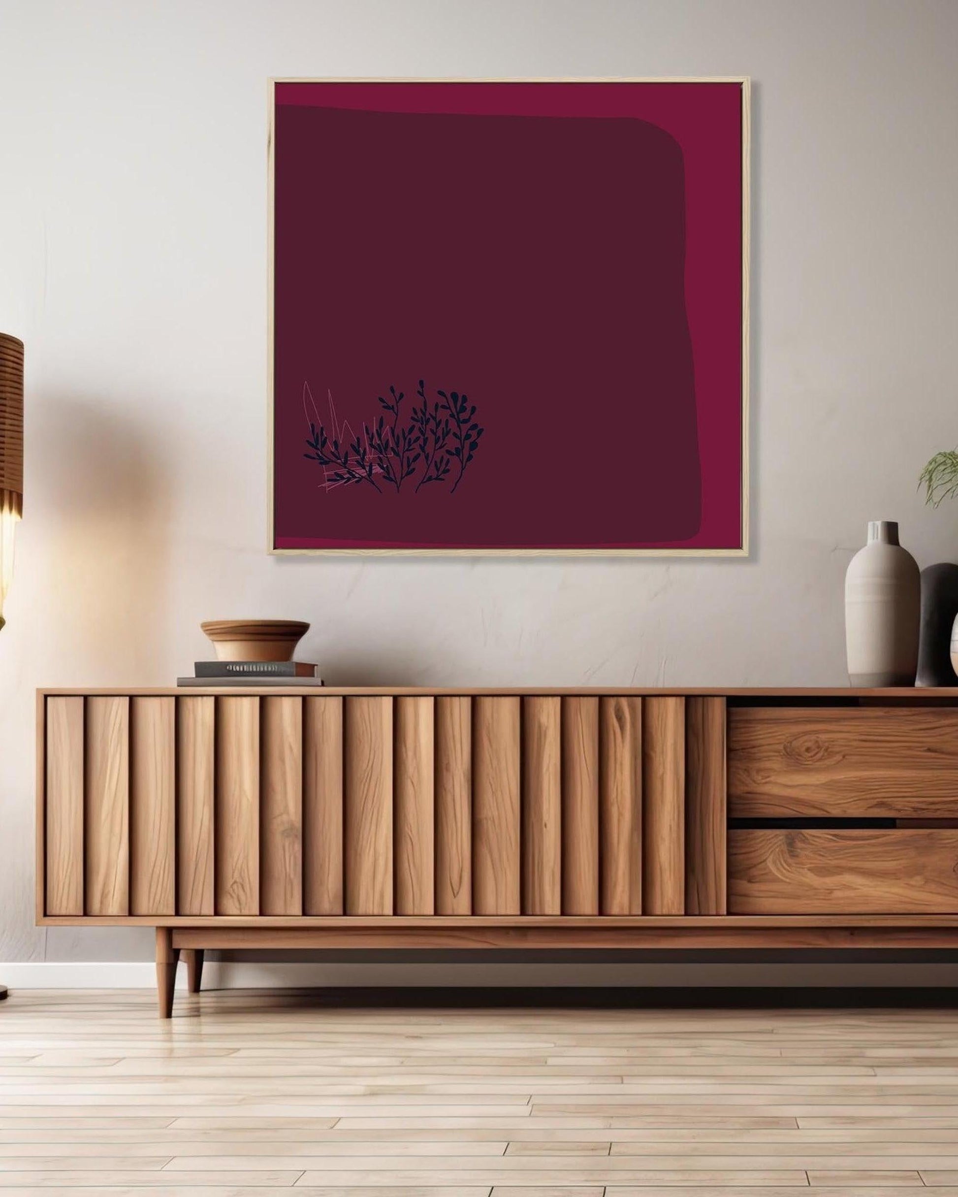 Wooden sideboard with abstract art on a wall in a room.