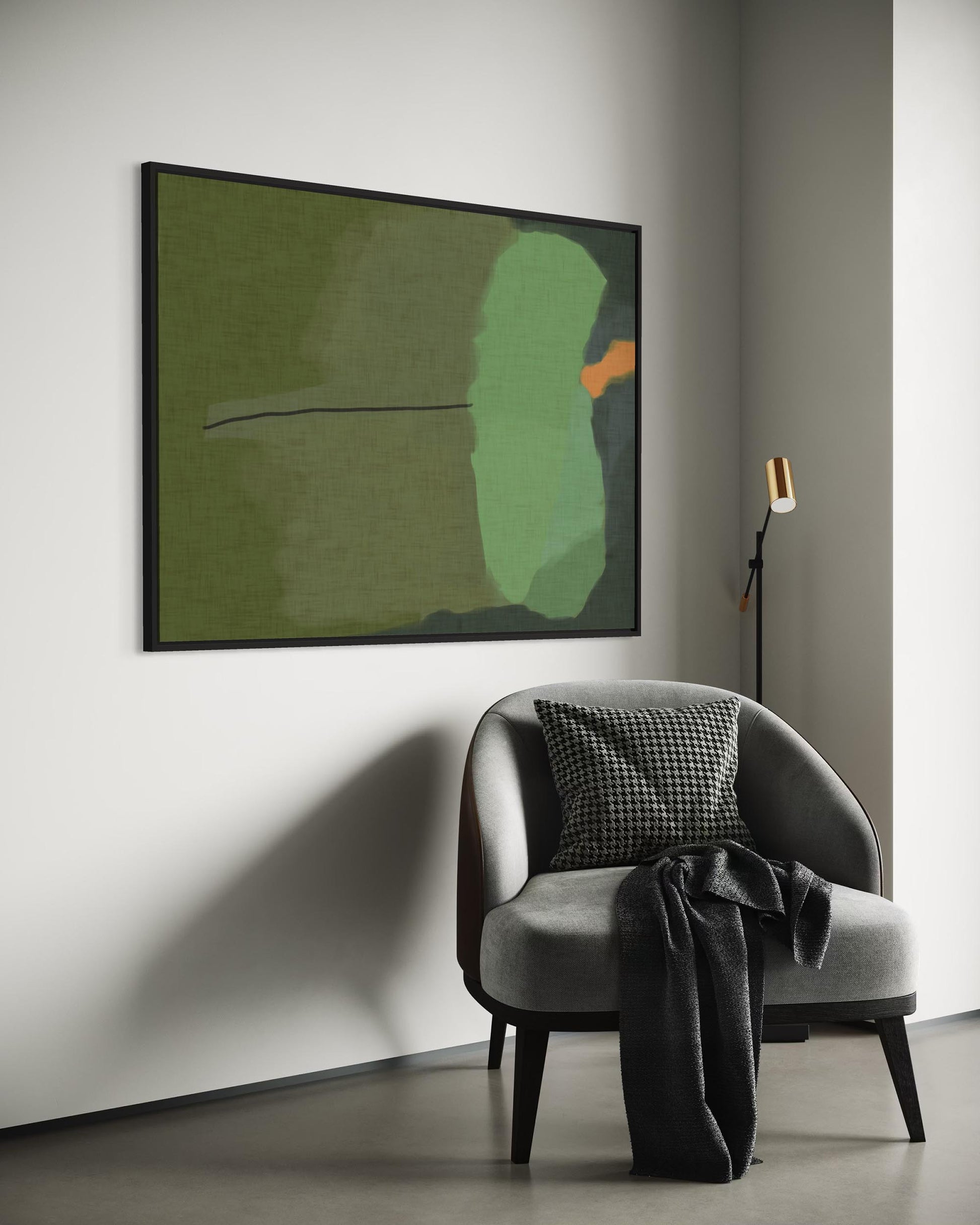 Gray armchair with a checkered pillow and dark blanket in front of a green abstract painting on a white wall.