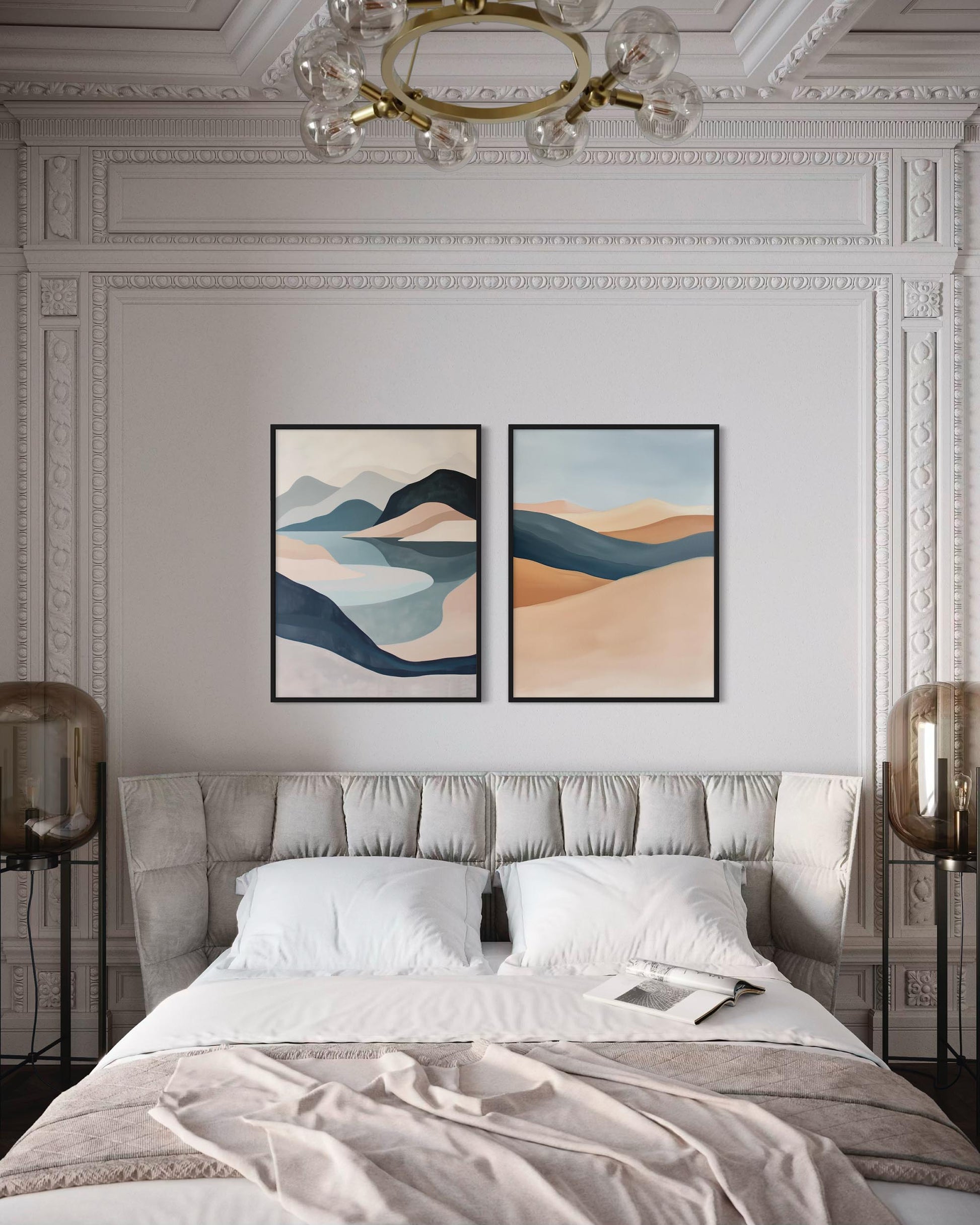 Two abstract landscape paintings above a bed in a stylish bedroom.
