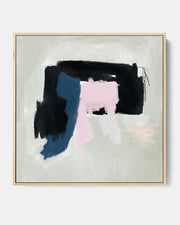 A framed canvas featuring an abstract design with pink and navy shapes on a grey background, presented in a gold-colored frame.