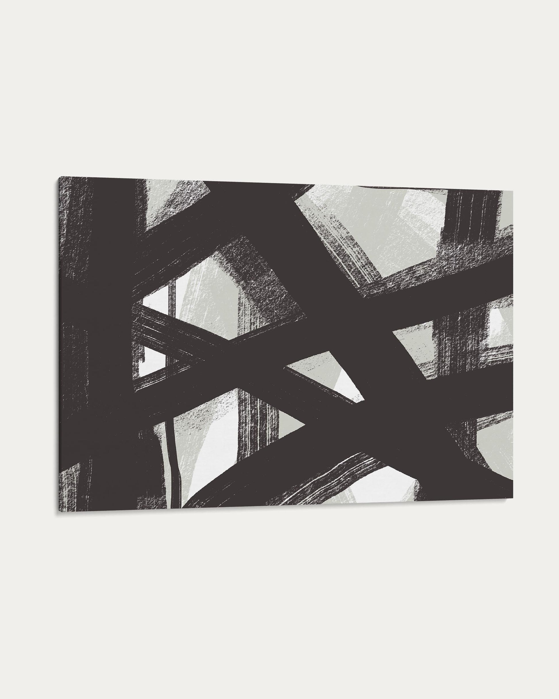 Abstract design with black and white geometric patterns on a textured surface