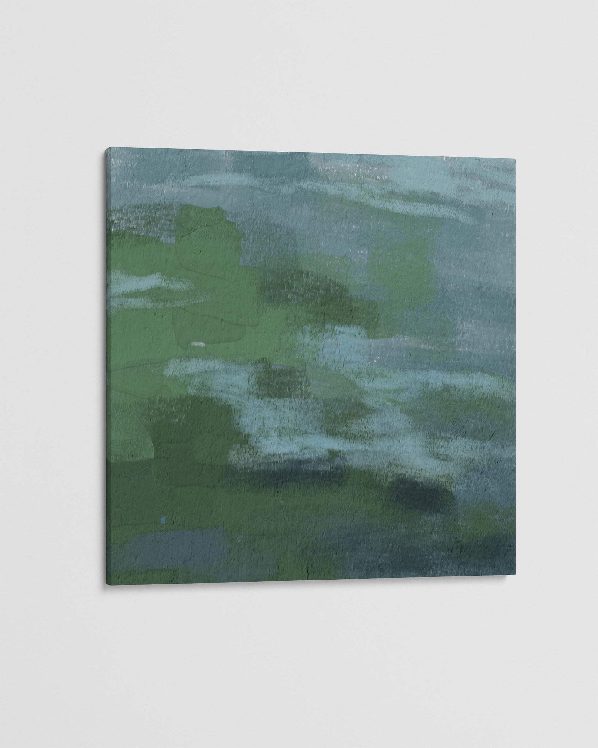 Abstract painting with green and blue tones on a white background