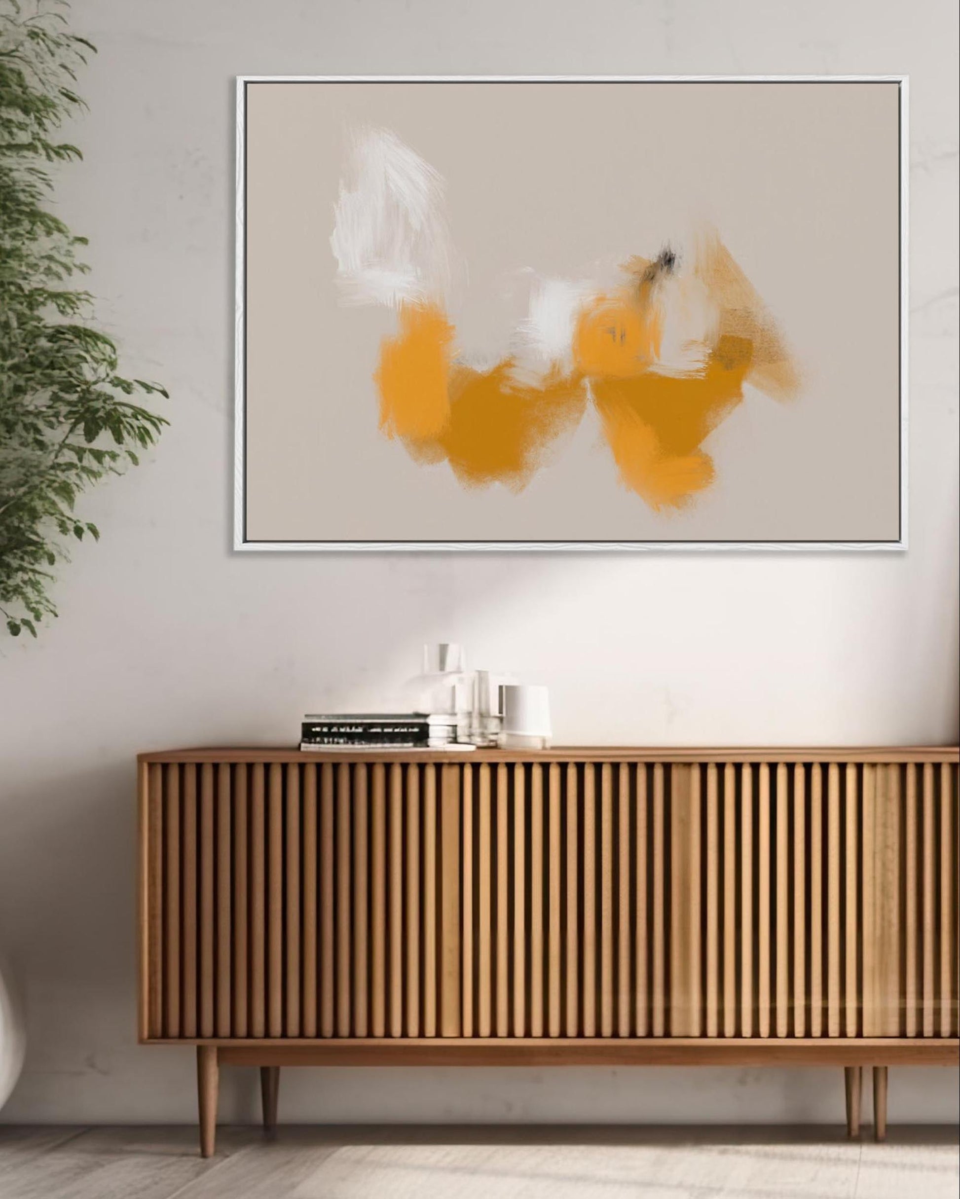 Modern interior with wooden sideboard, abstract art, and plant
