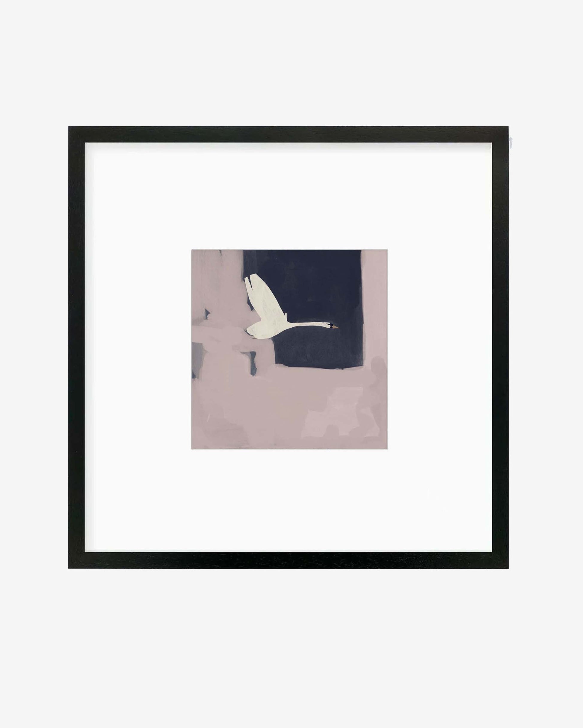 Framed art print of a swan in flight with a predominantly pink background, encased in a black frame.