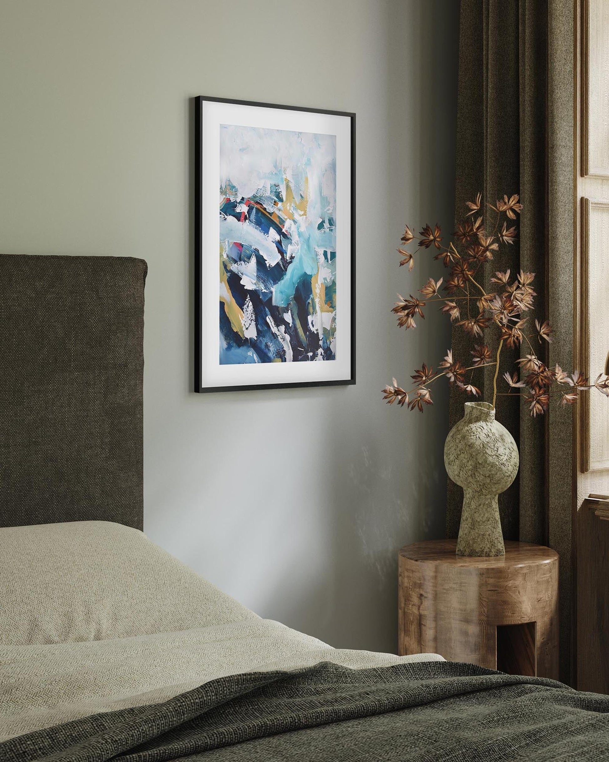 Modern bedroom with abstract art, vase with branches, and wooden nightstand.