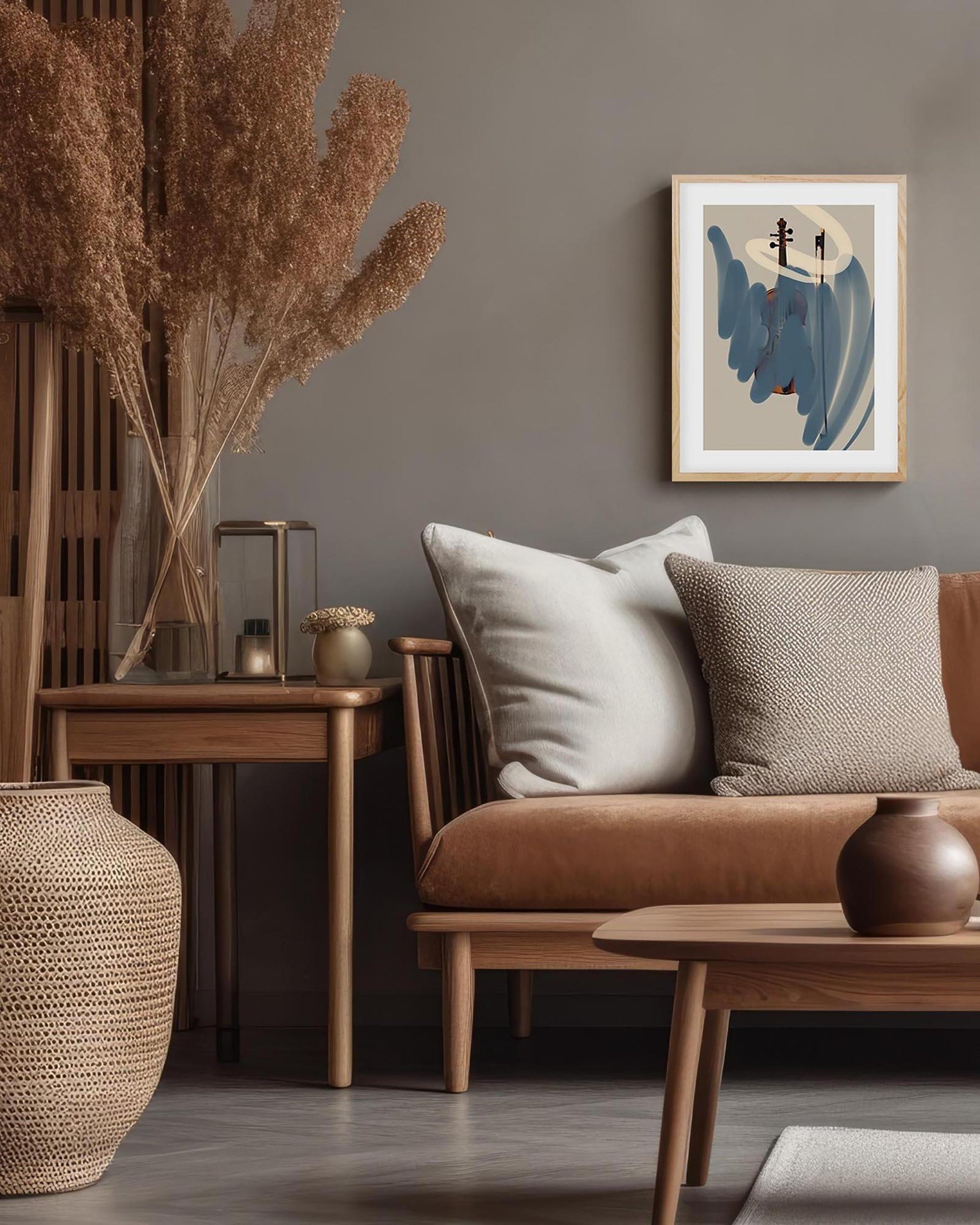 Cozy living room with brown sofa, wooden coffee table, and abstract art on gray wall.
