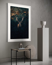 Framed artwork of a deer in a forest scene on a wall with minimal decor.