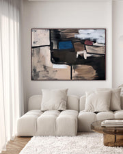 Modern living room with a neutral color palette, featuring a large abstract painting above a beige sofa.