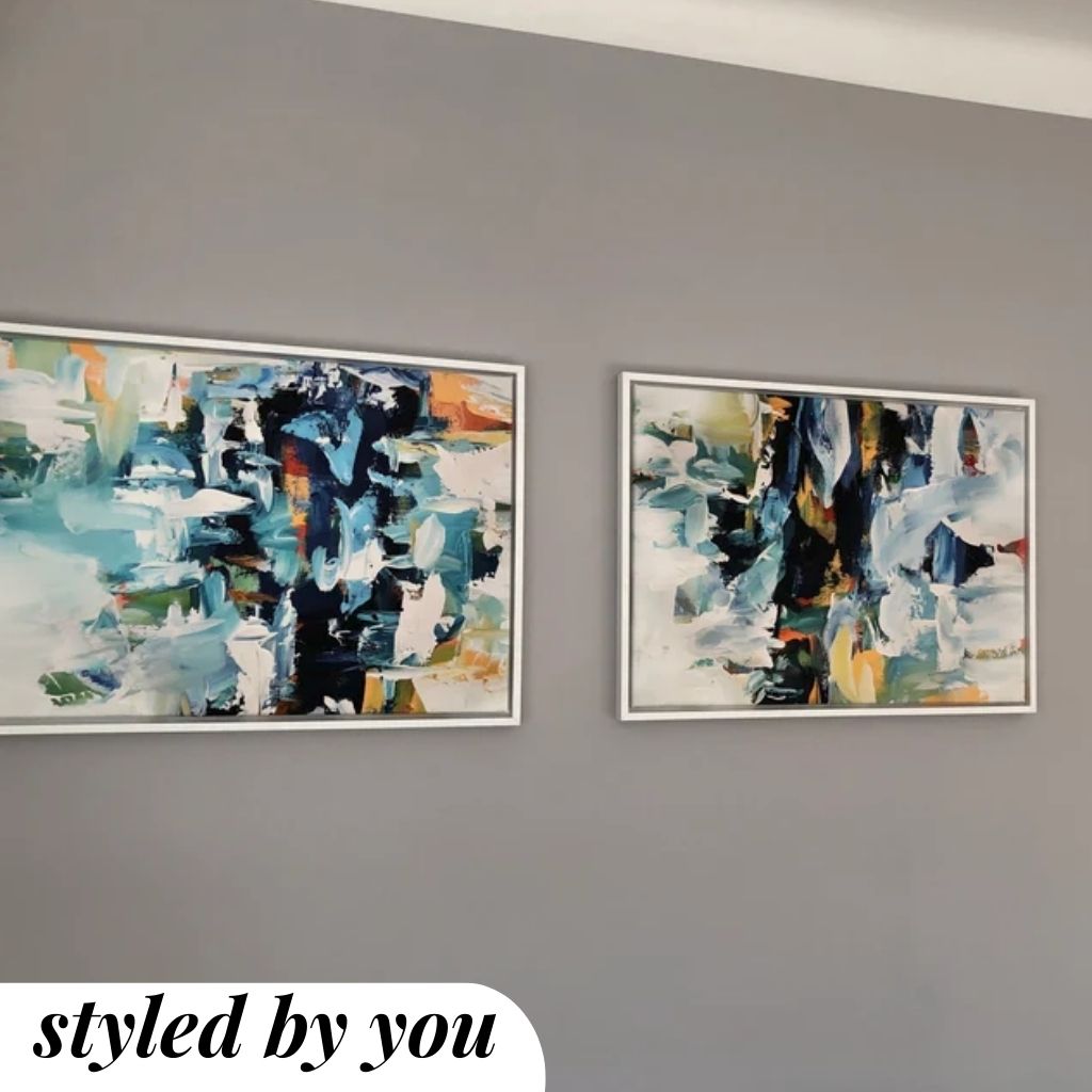 framed canvas prints hung on a wall