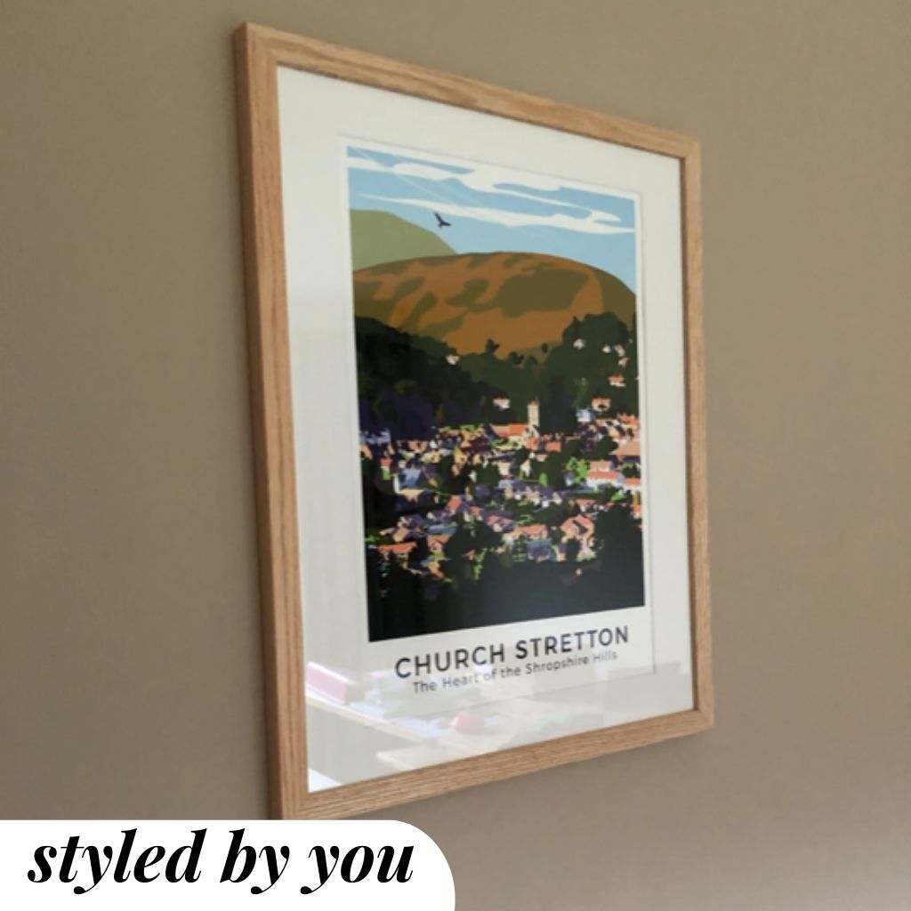 wooden picture frame hung on wall
