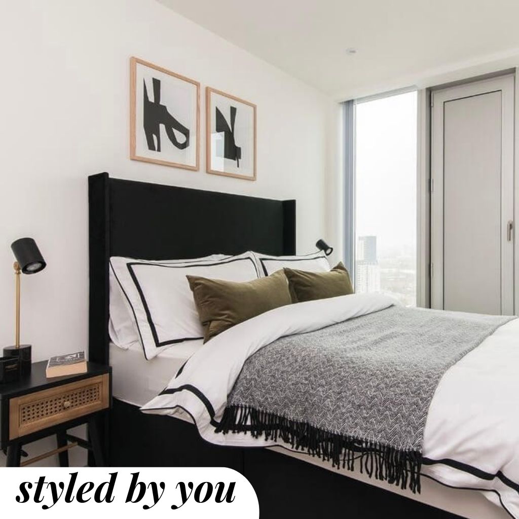 framed print above a bed