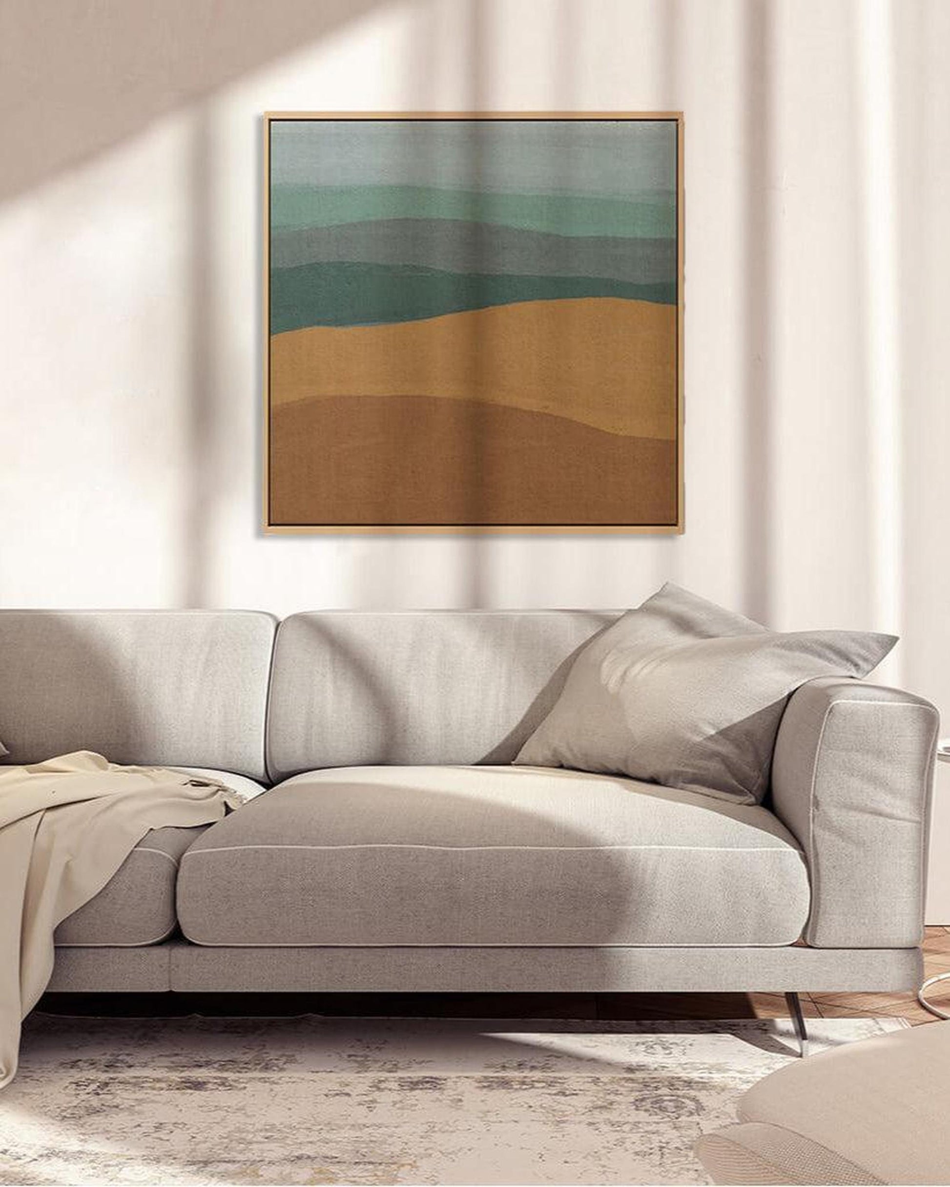 Gray sofa with a abstract painting in a living room