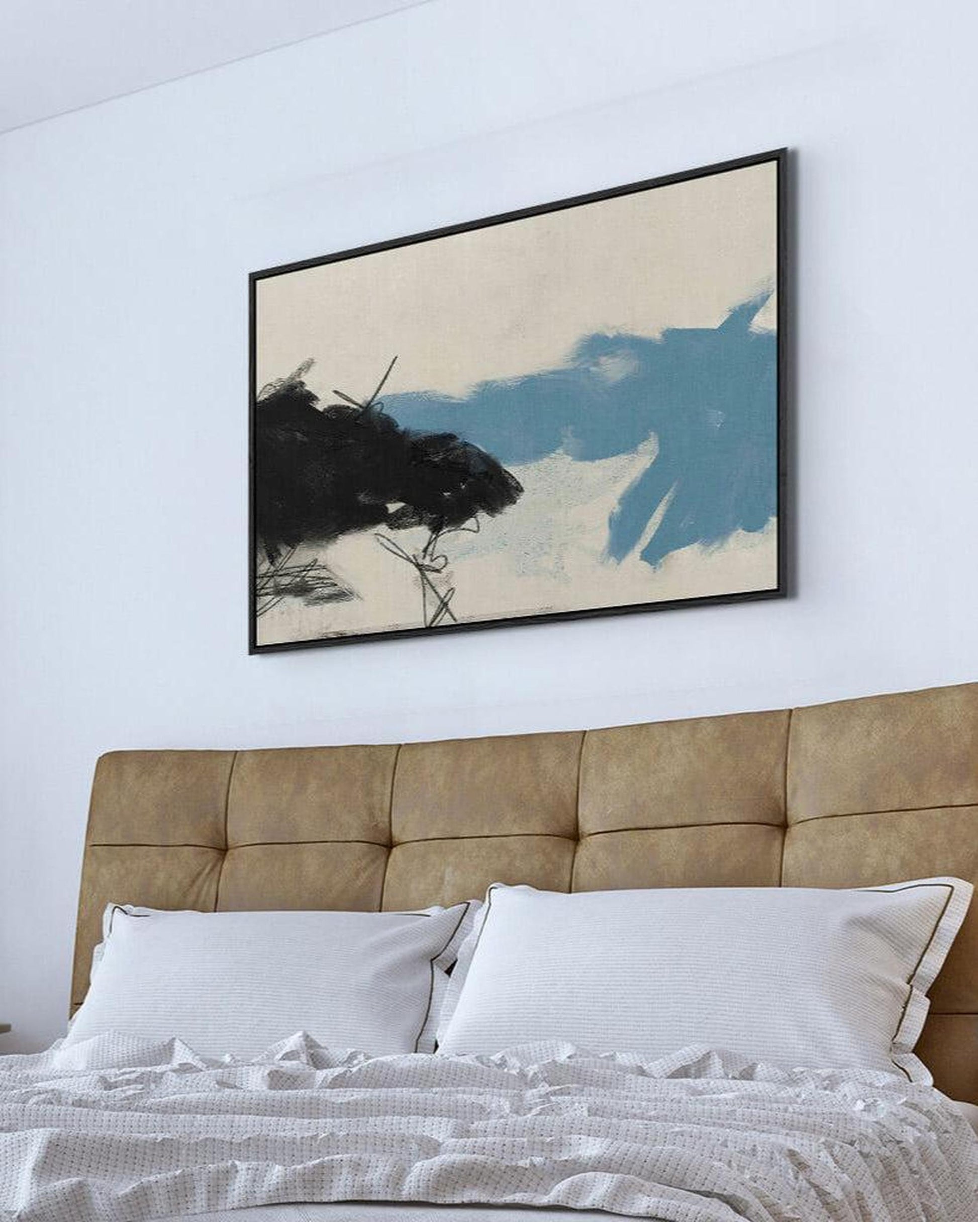 Bedroom with a large abstract painting above a bed