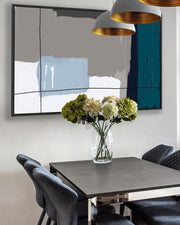 Modern dining room with a table, chairs, and decorative elements.