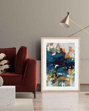 Modern living room with a red sofa, abstract art print, and floor lamp.