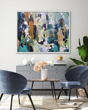 Modern living room with abstract art, blue chairs, and a side table.