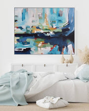 Abstract painting on a wall above a bed in a bedroom